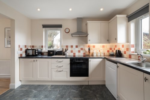 The well-appointed kitchen promises home-from-home convenience in a stunning setting.