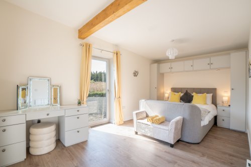 Sink into the plush bed in this sanctuary-like master suite