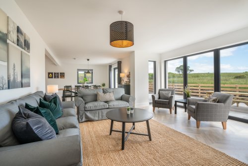 Beautiful views through floor to ceiling windows in the open plan living space