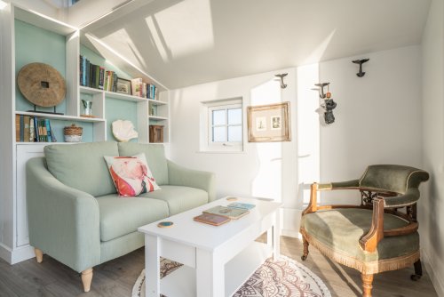 Cosy up with a page turner or soak up the sea view