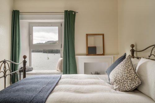 Wake up to stunning sea views across Tobermory Bay
