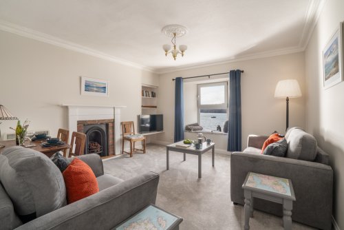 Watch yachts sail into the bay from the window here