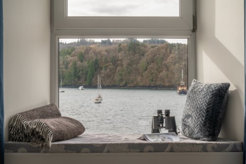 Watch visiting boats and wildlife from the window at Staffa