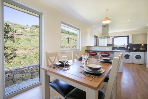 Lovely kitchen and dining room with lots of natural light