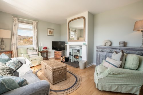 Natural light fills the living space in this cosy cottage for four