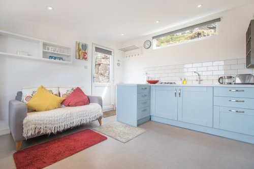 Open plan living area in The Pod