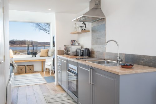 Gorgeous fitted kitchen leading to living area