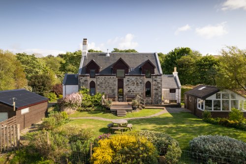 The Old Church's stunning coastal setting in pretty gardens