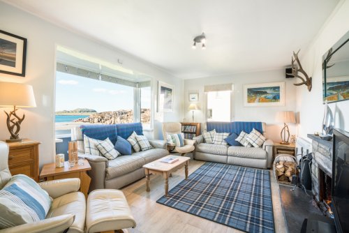 Soak up the sea views from the ultra cosy living room