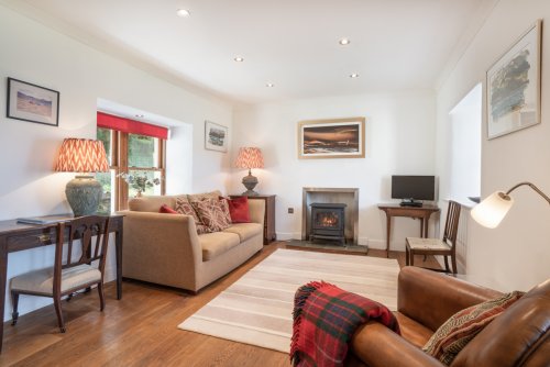 The welcoming living room in Tigh na Mara with sea views
