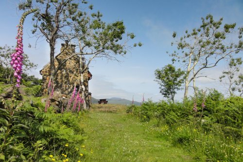 Charming gardens surround the cottage in this beautiful corner of Mull