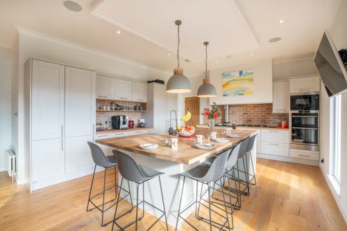 Chefs will be delighted by the large kitchen with glorious loch views
