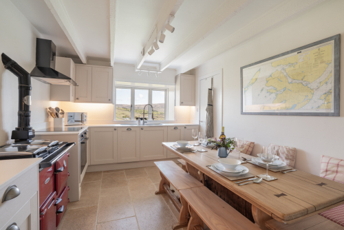 The light and inviting kitchen, which blends country charm with contemporary convenience