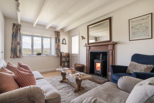 Snuggle up whatever the weather in the inviting snug