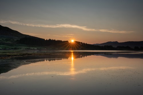 Sunrise over Kilfinichen Bay, the setting for Fisherman's Bothy and the Old Post Office