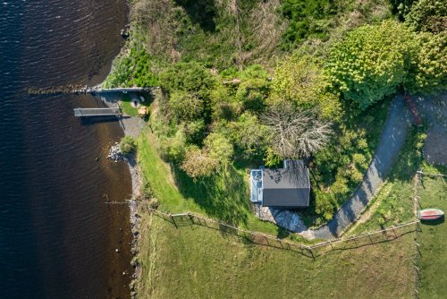 A bird's eye view of Assapol Lodge, the loch and pier