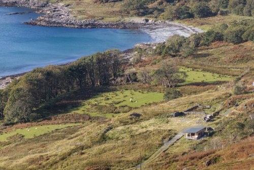 A bird's eye view of Rocking Stone Cabin's stunning setting at Lochbuie