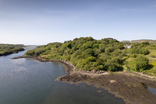 Call this idyllic spot home for your stay, with the sea at Loch Cuin only a short stroll from the door