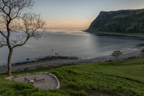 Wander over to the lookout with sitting area and fire pit above the beach